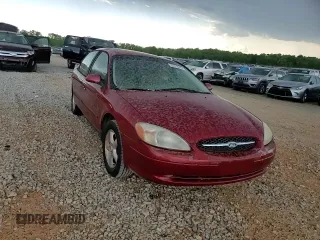 2000 Ford Taurus SES with VIN 1FAFP55U1YA262488, listed as a Copart auction lot 52312645 with 128,621 mi miles and Salvage Title. Bid and sale history available at DreamBid. Image 11.