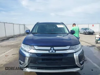 2016 Mitsubishi Outlander SE with VIN JA4AZ3A32GZ064867, listed as a IAAI auction lot 41599000 with 113,159 mi miles and . Bid and sale history available at DreamBid. Image 12.