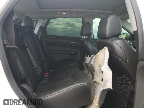2012 Cadillac SRX Performance Collection with VIN 3GYFNBE33CS540914, listed as a Copart auction lot 54787125 with 130,357 mi miles and Salvage title. Bid and sale history available at DreamBid. Image 11.