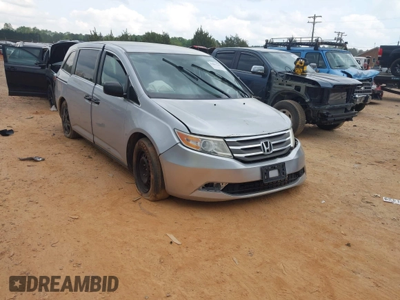 2013 Honda Odyssey LX with VIN 5FNRL5H27DB075559, listed as a IAAI auction lot 42007141 with Not Provided miles and . Bid and sale history available at carsss.com. Image 1.