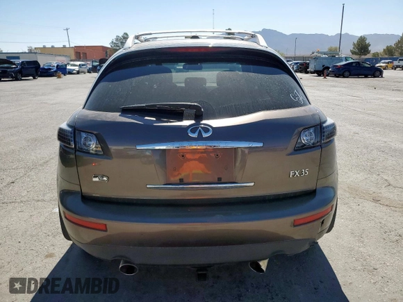 2008 Infiniti FX z VIN JNRAS08W38X203278, wystawiony jako Copart lot #57710405 z przebiegiem 168 007 mil mil oraz Szkoda całkowita • Salvage title. Historia ofert i sprzedaży dostępna na DreamBid. Obrazek 6.