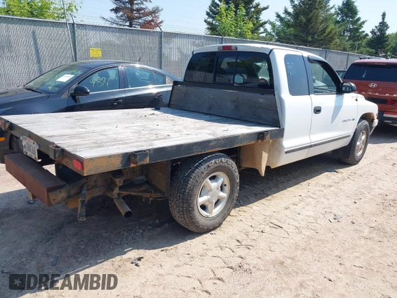 1998 Dodge Dakota SLT z VIN 1B7GL22X9WS620905, wystawiony jako IAAI lot #42388299 z przebiegiem 146 315 mil mil oraz . Historia ofert i sprzedaży dostępna na DreamBid. Obrazek 4.