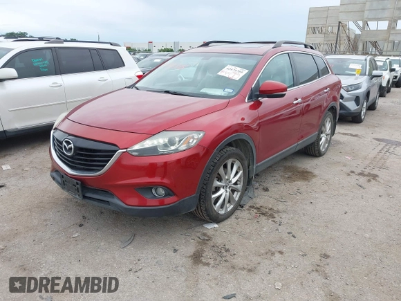2015 Mazda CX-9 Grand Touring with VIN JM3TB2DA6F0460785, listed as a IAAI auction lot 42474705 with 62,202 mi miles and . Bid and sale history available at DreamBid. Image 2.