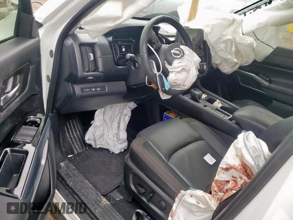 2024 Nissan Pathfinder SL with VIN 5N1DR3CA4RC309586, listed as a Copart auction lot 60313545 with 6,167 mi miles and Salvage title. Bid and sale history available at DreamBid. Image 8.