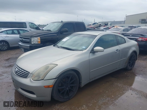 2004 Infiniti G35 Coupe w/Leather with VIN JNKCV54E14M812373, listed as a IAAI auction lot 42104848 with 168,769 mi miles. Bid and sale history available at carsss.com. Image 2.