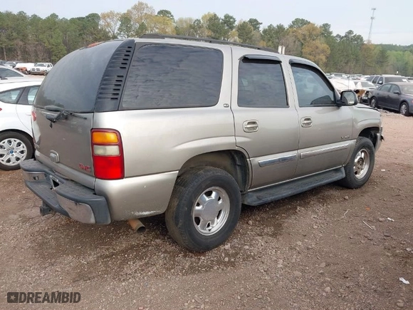 2003 GMC Yukon SLT with VIN 1GKEC13Z33R161136, listed as a IAAI auction lot 41907443 with 325,842 mi miles. Bid and sale history available at carsss.com. Image 4.