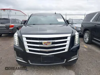 2015 Cadillac Escalade ESV Premium z VIN 1GYS4TKJ3FR726972, wystawiony jako IAAI lot #42085232 z przebiegiem 234 115 mil mil oraz . Historia ofert i sprzedaży dostępna na DreamBid. Obrazek 6.