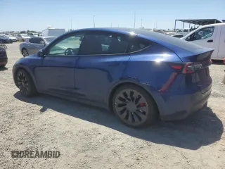 2022 Tesla Model Y Performance z VIN 7SAYGDEF6NF337710, wystawiony jako Copart lot #60200985 z przebiegiem 101 168 mil mil oraz Szkoda całkowita • Salvage title. Historia ofert i sprzedaży dostępna na DreamBid. Obrazek 2.