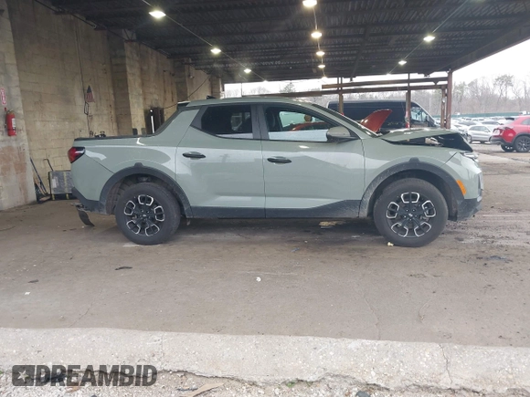 2024 Hyundai Santa Cruz SEL z VIN 5NTJBDDE6RH120060, wystawiony jako IAAI lot #42027494 z przebiegiem 10 075 mil mil oraz . Historia ofert i sprzedaży dostępna na DreamBid. Obrazek 13.