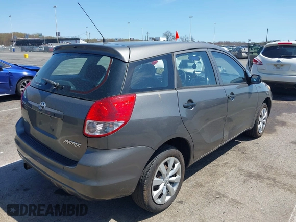 2004 Toyota Matrix Std with VIN 2T1LR32E94C300810, listed as a IAAI auction lot 42072785 with 177,026 mi miles. Bid and sale history available at carsss.com. Image 4.