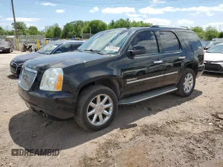 2011 GMC Yukon Denali z VIN 1GKS2EEF2BR308951, wystawiony jako Copart lot #57052825 z przebiegiem 217 895 mil mil oraz Tytuł czysty. Historia ofert i sprzedaży dostępna na DreamBid. Obrazek 1.