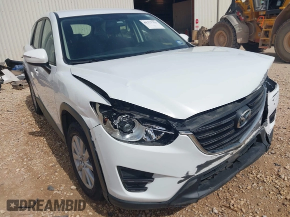 2016 Mazda CX-5 Sport with VIN JM3KE2BYXG0683318, listed as a IAAI auction lot 41777751 with 116,922 mi miles. Bid and sale history available at carsss.com. Image 18.