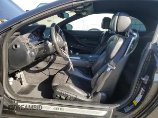 2013 BMW M6 z VIN WBSLZ9C56DDZ77892, wystawiony jako Copart lot #52102785 z przebiegiem 94 380 mil mil oraz Szkoda całkowita • Salvage title. Historia ofert i sprzedaży dostępna na DreamBid. Obrazek 7.