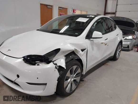 2022 Tesla Model Y Long Range z VIN 7SAYGDEE3NF358487, wystawiony jako IAAI lot #42036969 z przebiegiem 52 723 mil mil oraz . Historia ofert i sprzedaży dostępna na DreamBid. Obrazek 6.