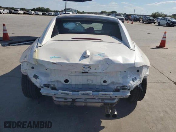 2023 Mazda MX-5 Miata Grand Touring with VIN JM1NDAM76P0561207, listed as a Copart auction lot 72202434 with 6,928 mi miles and Salvage title. Bid and sale history available at DreamBid. Image 6.