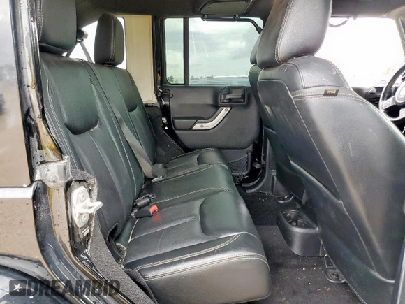 2015 Jeep Wrangler Unlimited Rubicon Hard Rock with VIN 1C4HJWFG1FL710264, listed as a Copart auction lot 54123285 with 96,737 mi miles and Salvage title. Bid and sale history available at DreamBid. Image 11.