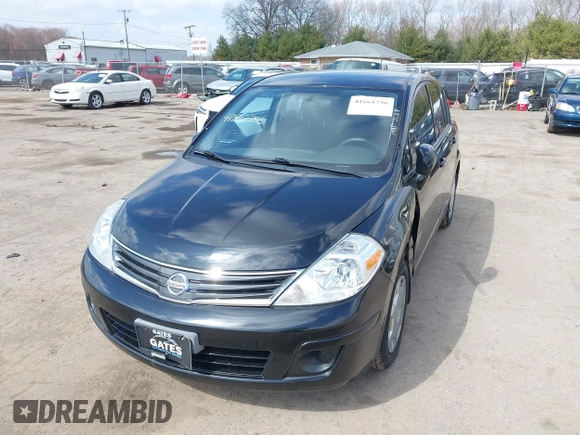 2012 Nissan Versa S with VIN 3N1BC1CP9CK290446, listed as a IAAI auction lot 41861756 with 124,883 mi miles. Bid and sale history available at carsss.com. Image 2.