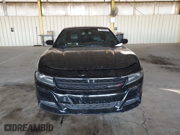 2015 Dodge Charger SXT with VIN 2C3CDXJG9FH748809, listed as a Copart auction lot 61682335 with 128,252 mi miles and Salvage title. Bid and sale history available at DreamBid. Image 5.