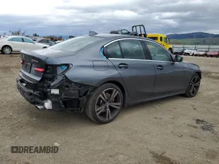 2021 BMW 3 Series 330e with VIN 3MW5P7J02M8B94208, listed as a Copart auction lot 48971455 with 22,228 mi miles and Salvage Title. Bid and sale history available at carsss.com. Image 3.
