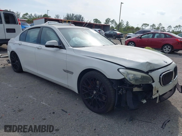 2013 BMW 7 Series 740i with VIN WBAYA6C52DD143862, listed as a IAAI auction lot 41859183 with 133,666 mi miles. Bid and sale history available at carsss.com. Image 1.
