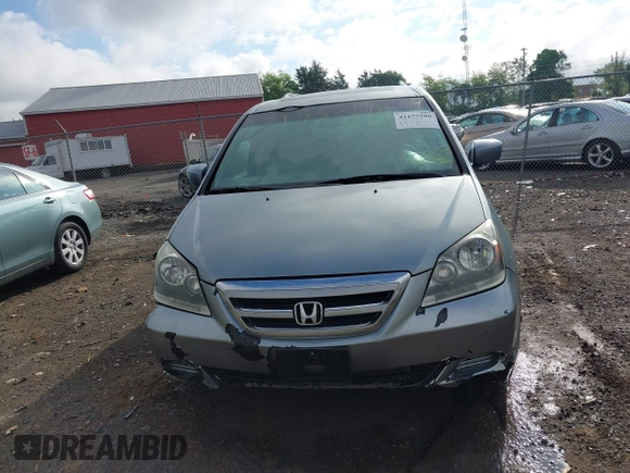 2007 Honda Odyssey EX-L z VIN 5FNRL38717B002725, wystawiony jako IAAI lot #42177209 z przebiegiem 226 706 mil mil oraz . Historia ofert i sprzedaży dostępna na DreamBid. Obrazek 12.