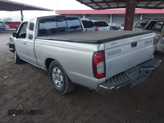 1999 Nissan Frontier XE z VIN 1N6DD26S3XC340419, wystawiony jako IAAI lot #40964630 z przebiegiem 156 431 mil mil oraz . Historia ofert i sprzedaży dostępna na DreamBid. Obrazek 3.
