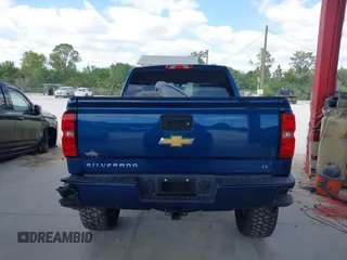 2018 Chevrolet Silverado 1500 LT with VIN 3GCUKREC0JG366590, listed as a IAAI auction lot 42045634 with 92,989 mi miles. Bid and sale history available at carsss.com. Image 16.