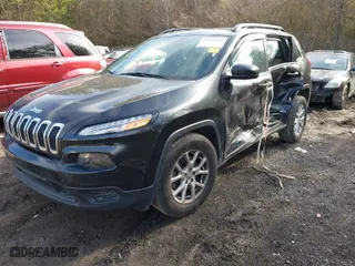2016 Jeep Cherokee Sport with VIN 1C4PJLAS9GW208334, listed as a IAAI auction lot 41449928 with 163,826 mi miles. Bid and sale history available at carsss.com. Image 2.