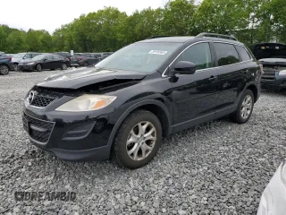 2011 Mazda CX-9 Sport z VIN JM3TB3BV4B0314200, wystawiony jako Copart lot #59104965 z przebiegiem 142 375 mil mil oraz Czysty tytuł • Clean title. Historia ofert i sprzedaży dostępna na DreamBid. Obrazek 1.