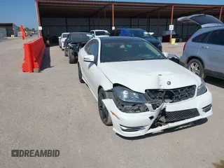 2015 Mercedes-Benz C-Class C 250 with VIN WDDGJ4HB1FG403788, listed as a IAAI auction lot 40495537 with 129,832 mi miles. Bid and sale history available at carsss.com. Image 1.