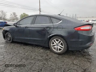2014 Ford Fusion SE with VIN 3FA6P0H7XER330023, listed as a Copart auction lot 48658285 with 225,660 mi miles and Salvage Title. Bid and sale history available at DreamBid. Image 2.