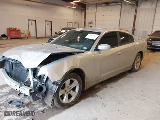 2011 Dodge Charger SE with VIN 2B3CL3CG0BH615016, listed as a IAAI auction lot 41669366 with 203,197 mi miles. Bid and sale history available at carsss.com. Image 2.