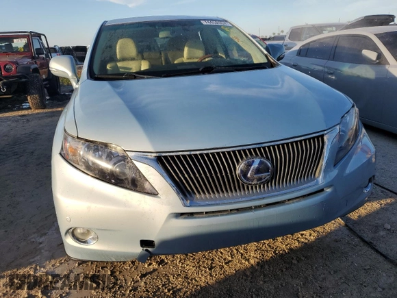 2012 Lexus RX 450h with VIN JTJZB1BA9C2006141, listed as a Copart auction lot 74452404 with Not provided miles and Salvage title. Bid and sale history available at DreamBid. Image 5.