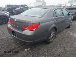 2007 Toyota Avalon XL with VIN 4T1BK36B47U171569, listed as a IAAI auction lot 41800454 with 237,627 mi miles. Bid and sale history available at carsss.com. Image 4.