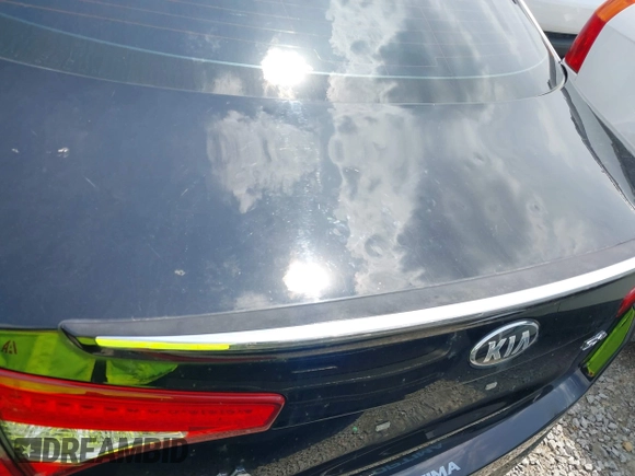 2013 Kia Optima SX with VIN 5XXGR4A63DG141938, listed as a IAAI auction lot 41760964 with 77,241 mi miles and . Bid and sale history available at DreamBid. Image 16.