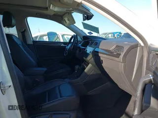2018 Volkswagen Tiguan SEL Premium with VIN 3VV5B7AX2JM202908, listed as a IAAI auction lot 41137619 with 84,323 mi miles and . Bid and sale history available at DreamBid. Image 5.