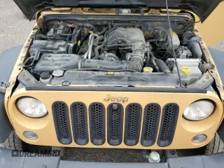 2014 Jeep Wrangler Sport with VIN 1C4AJWAG9EL190595, listed as a Copart auction lot 62496955 with 248,484 mi miles and Salvage title. Bid and sale history available at DreamBid. Image 11.