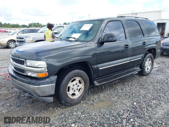 2004 Chevrolet Tahoe LT with VIN 1GNEC13Z04R103506, listed as a IAAI auction lot 42512048 with 197,840 mi miles and . Bid and sale history available at DreamBid. Image 2.