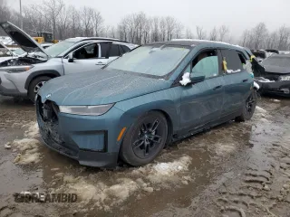 2023 BMW iX xDrive50 with VIN WB523CF02PCM42677, listed as a Copart auction lot 83855194 with 17,025 mi miles and Salvage Title. Bid and sale history available at carsss.com. Image 1.