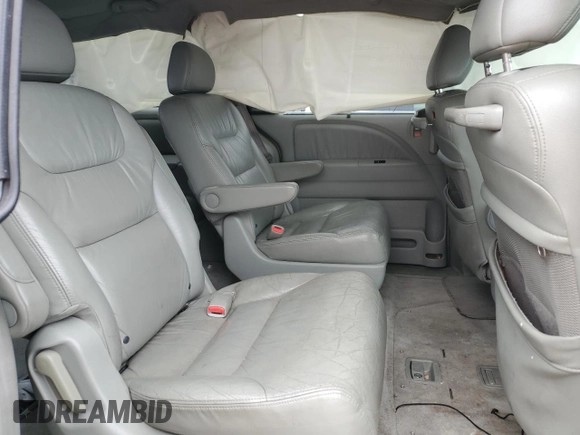 2006 Honda Odyssey EX-L z VIN 5FNRL38786B014188, wystawiony jako Copart lot #57140935 z przebiegiem Nie podano mil oraz Szkoda całkowita • Salvage title. Historia ofert i sprzedaży dostępna na DreamBid. Obrazek 11.