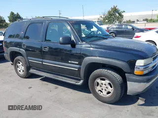 2002 Chevrolet Tahoe LS z VIN 1GNEC13T62R120187, wystawiony jako IAAI lot #42419862 z przebiegiem 203 766 mil mil oraz . Historia ofert i sprzedaży dostępna na DreamBid. Obrazek 1.