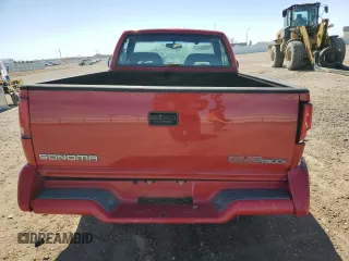 1995 GMC Sonoma z VIN 1GTCS144XS8524819, wystawiony jako Copart lot #52608765 z przebiegiem 84 794 mil mil oraz Szkody całkowita. Historia ofert i sprzedaży dostępna na DreamBid. Obrazek 6.