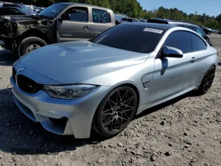 2015 BMW M4 with VIN WBS3R9C54FK329921, listed as a Copart auction lot 68893473 with 115,329 mi miles. Bid and sale history available at carsss.com. Image 1.