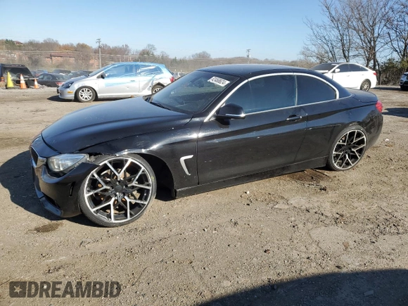 2015 BMW 4 Series 428i with VIN WBA3V7C56FP772739, listed as a Copart auction lot 82468624 with 50,320 mi miles and Salvage Title. Bid and sale history available at carsss.com. Image 1.