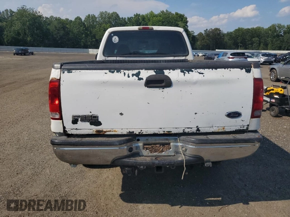 1999 Ford F-250 XL with VIN 1FTNX21LXXEC76365, listed as a Copart auction lot 63945125 with 522,235 mi miles and Clean title. Bid and sale history available at DreamBid. Image 6.