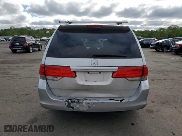 2010 Honda Odyssey EX z VIN 5FNRL3H43AB095521, wystawiony jako Copart lot #57322365 z przebiegiem 208 226 mil mil oraz Szkoda całkowita • Salvage title. Historia ofert i sprzedaży dostępna na DreamBid. Obrazek 6.
