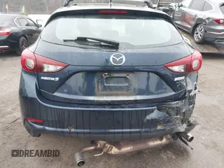 2018 Mazda 3 Touring with VIN 3MZBN1L34JM204883, listed as a IAAI auction lot 41094541 with 125,205 mi miles and . Bid and sale history available at DreamBid. Image 17.