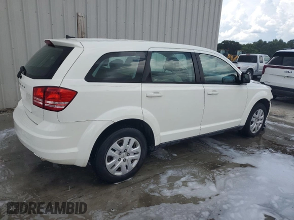 2014 Dodge Journey American Value with VIN 3C4PDCAB3ET216889, listed as a Copart auction lot 60874265 with 117,508 mi miles and Salvage title. Bid and sale history available at DreamBid. Image 3.