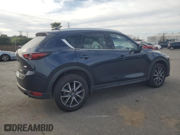 2018 Mazda CX-5 Grand Touring with VIN JM3KFADM7J0380568, listed as a Copart auction lot 48749015 with 53,401 mi miles and Salvage Title. Bid and sale history available at carsss.com. Image 3.