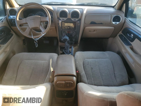 2002 GMC Envoy SLT with VIN 1GKDS13S922287249, listed as a Copart auction lot 88049875 with 157,485 mi miles and Salvage Title. Bid and sale history available at carsss.com. Image 8.